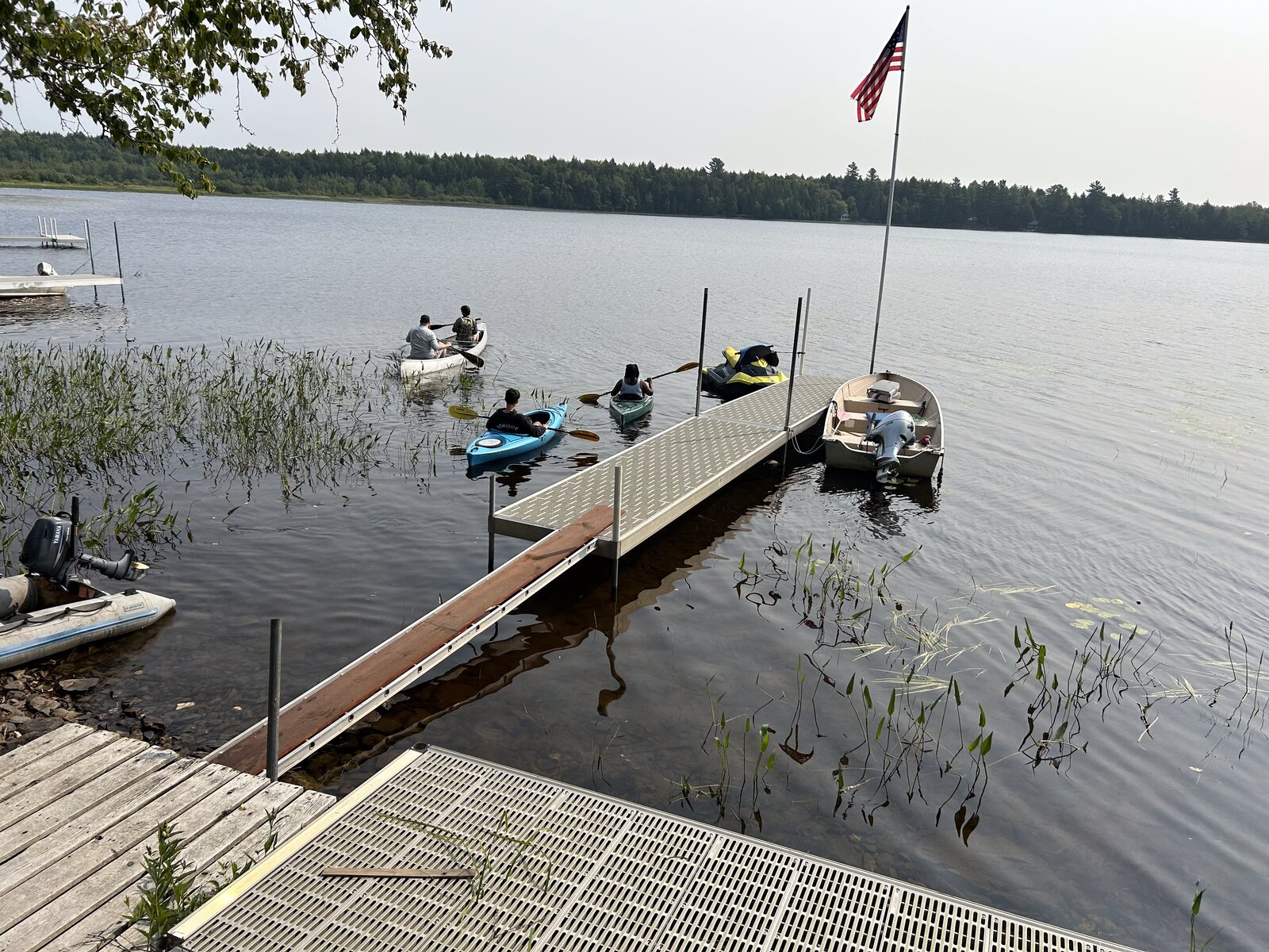 Kayaks off the dock at Molunkus Lake