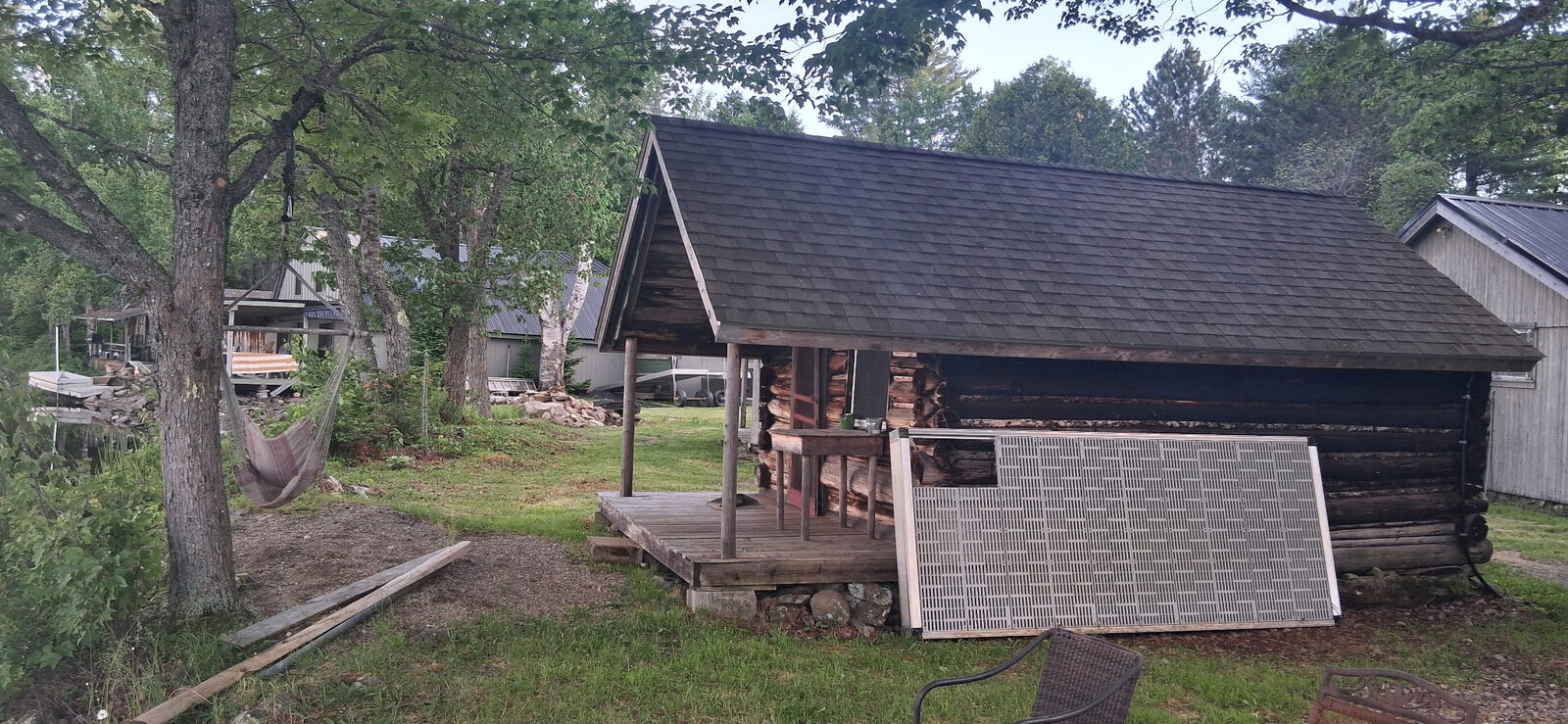 Original log camp at Molunkus Lake Sporting Camps