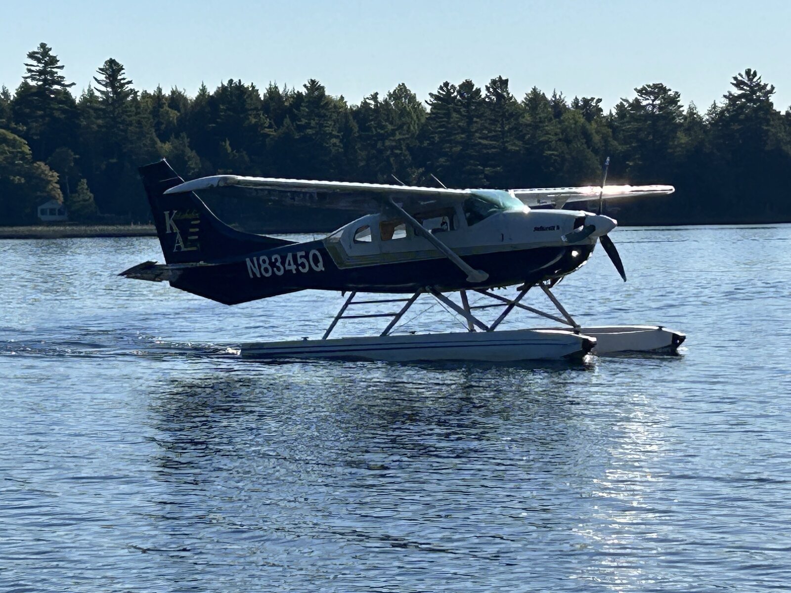 Seaplane taxiing on Molunkus Lake